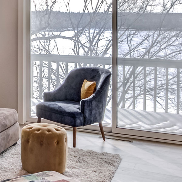 Chair in front of living room sliding glass door